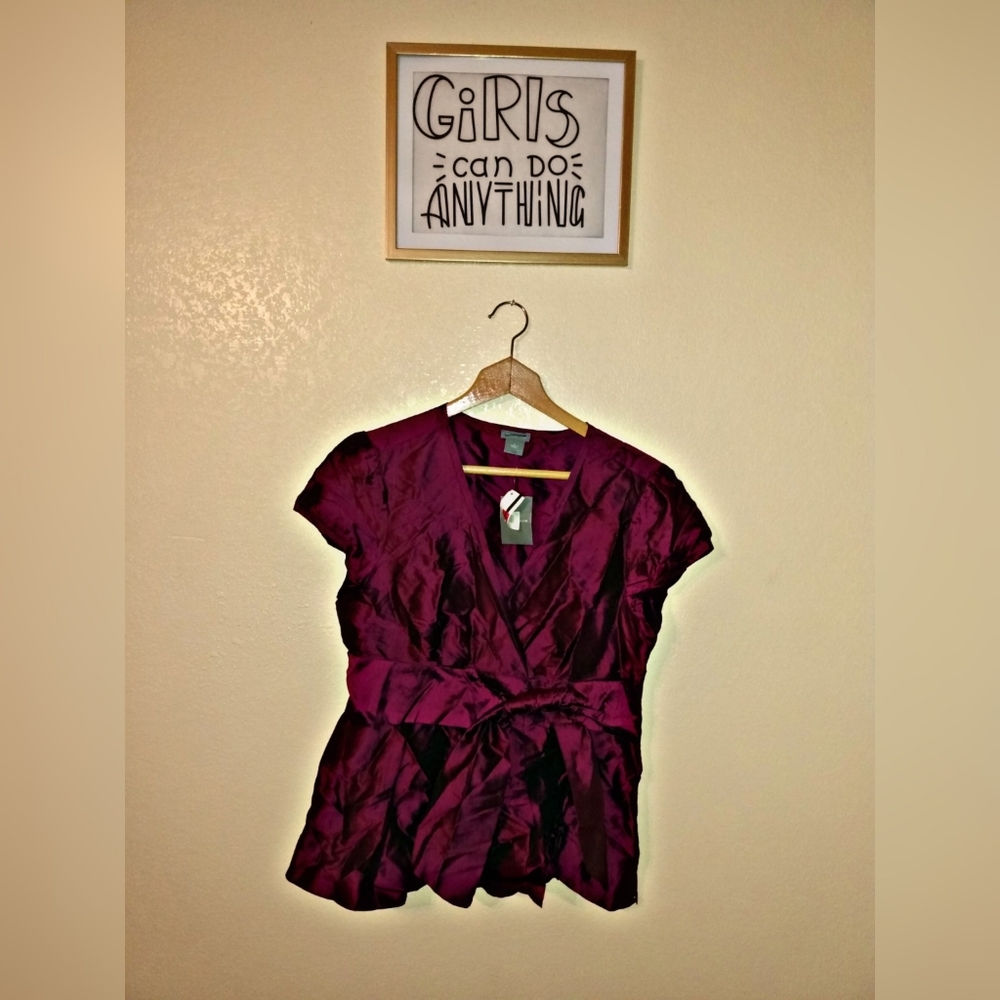 Metalic purple color blouse with cloth belt.